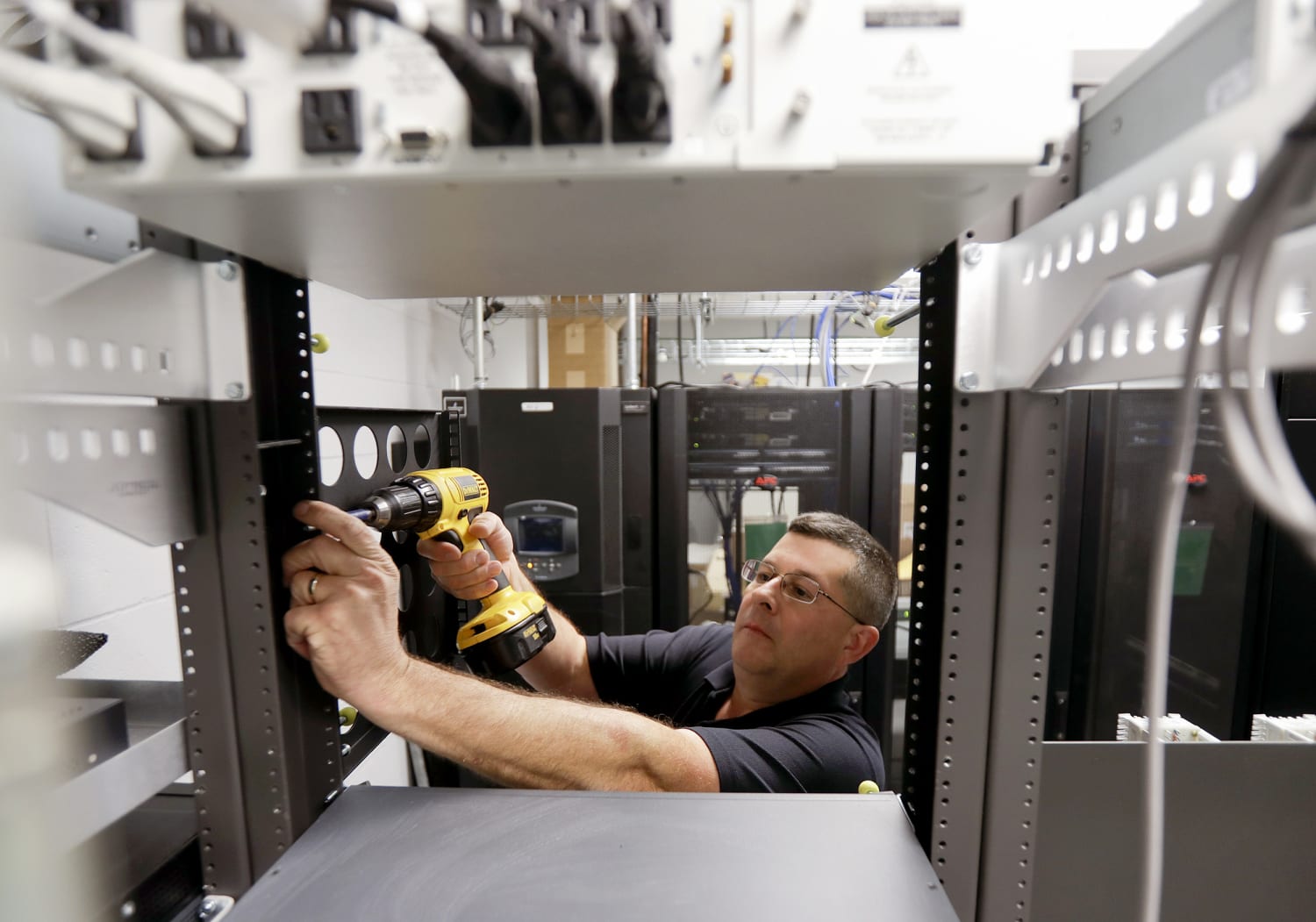 Hackers have taken down dozens of 911 centers. Why is it so hard to stop  them?