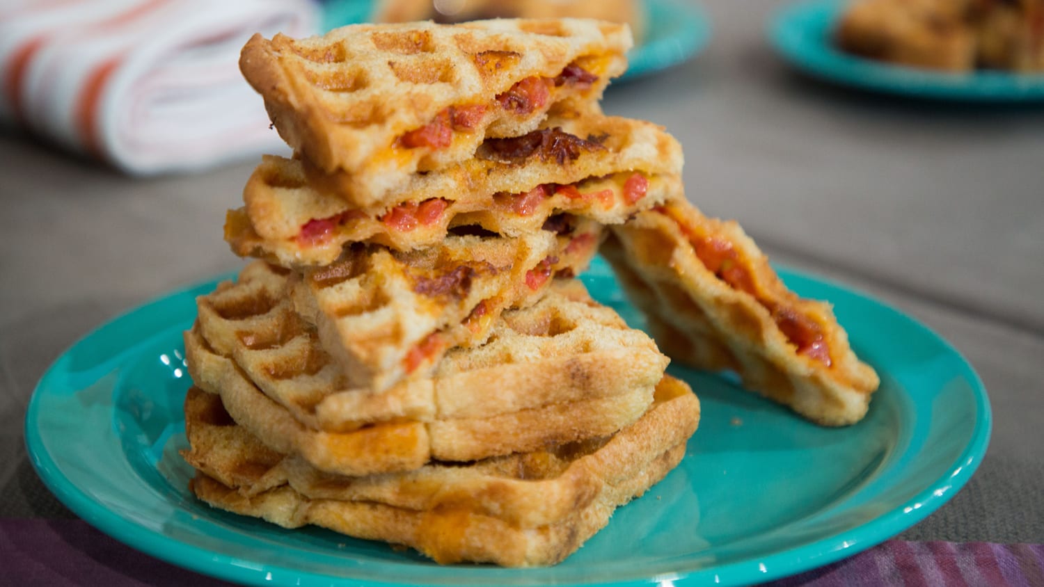 https://media-cldnry.s-nbcnews.com/image/upload/newscms/2018_15/1331484/waffle-bacon-and-tomato-grilled-cheese-today-tease-180412.jpg