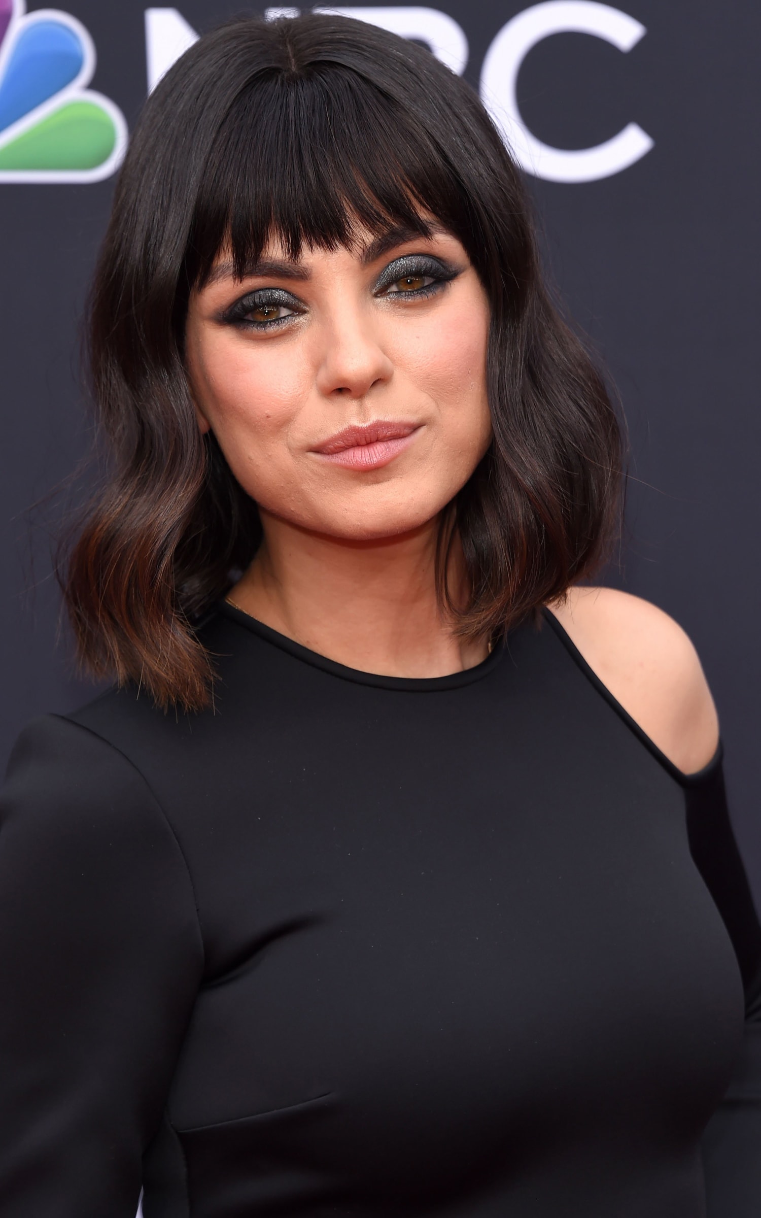 Mila Kunis unveiled a blunt bob and bangs at the Billboard Music Awards