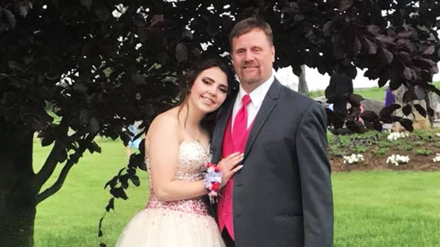 Dad brings his late sons girlfriend to the prom after fatal car crash photo