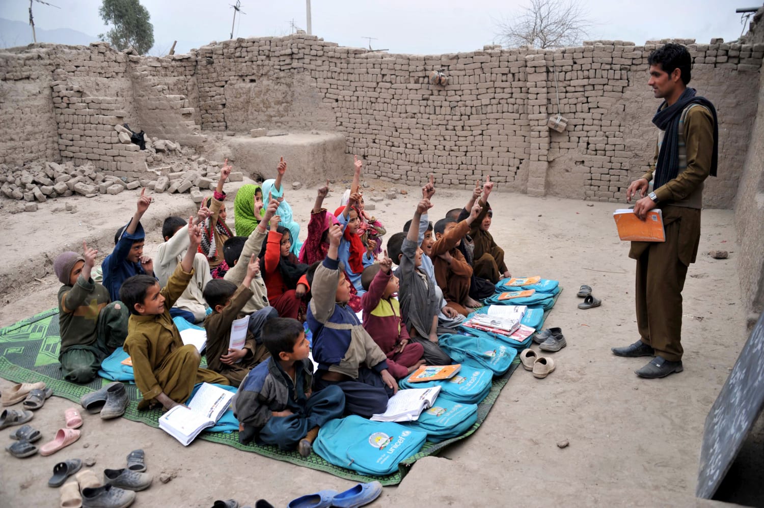 Nearly half of Afghan children don't go to school, with girls disproportionately affected