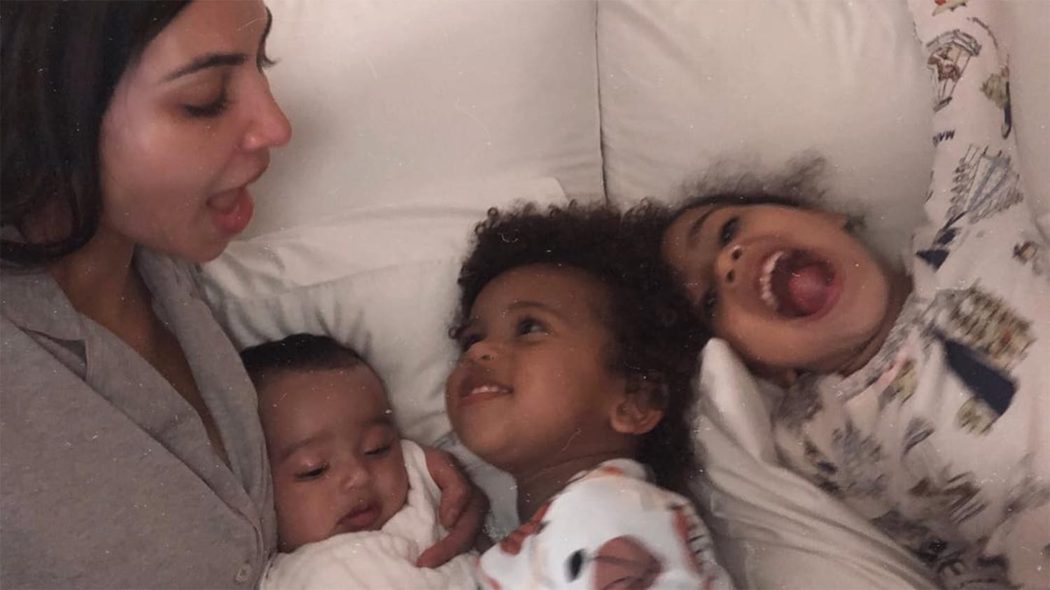 Kim Kardashian Snuggles With Baby Chicago Saint And North In Cute Pic