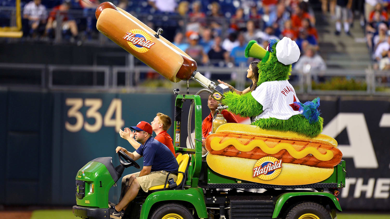 Woman hit in the face with hot dog cannon by Phillie Phanatic