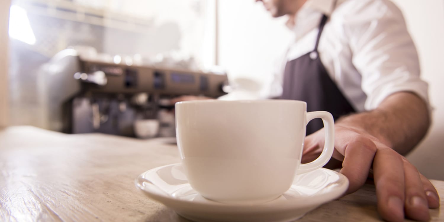 The Terrible Etiquette Mistake Everyone Makes With Hot Cafe Drinks