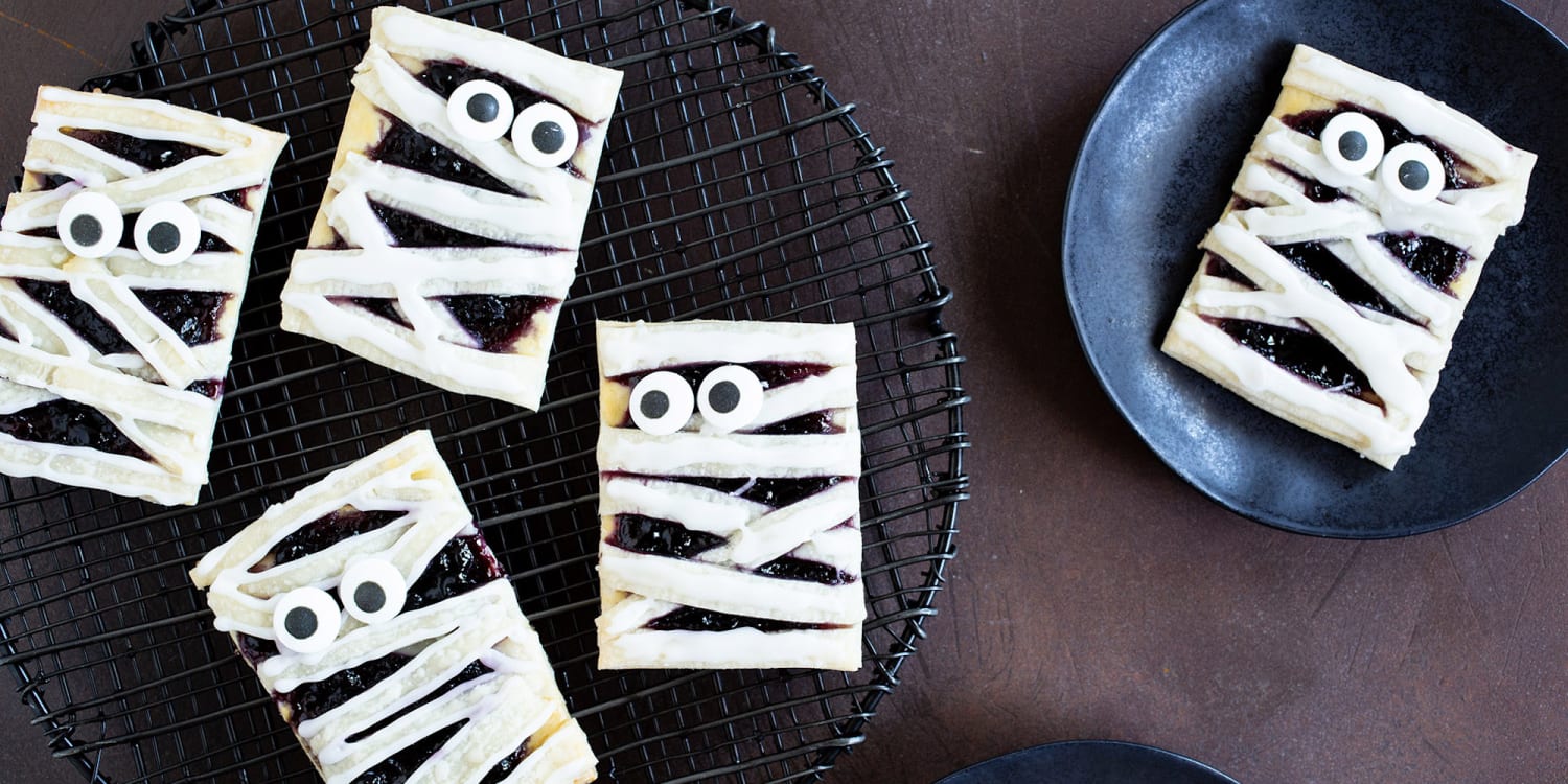 Serve up delightfully spooky berry mini mummy pies for Halloween