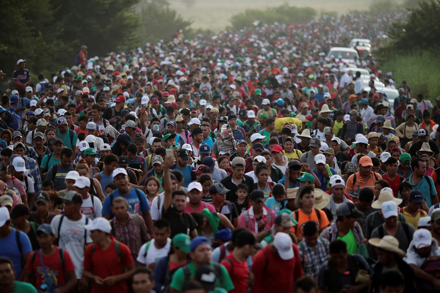 Honduran migrant caravan travelling by foot, estimated at 7,000