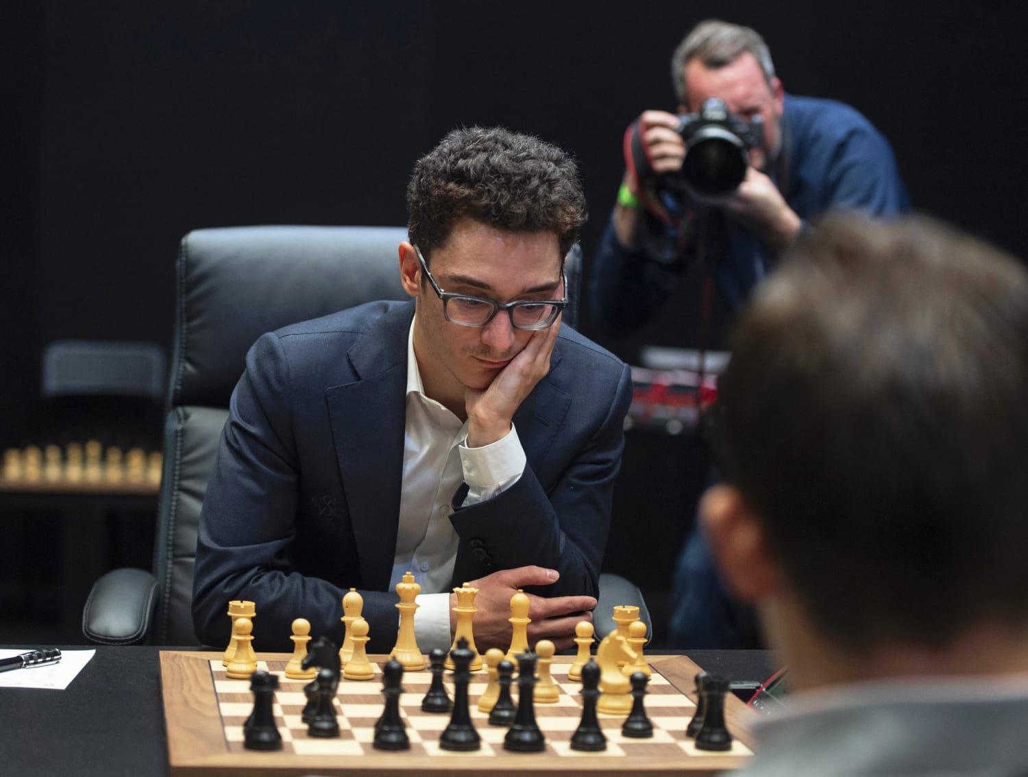 Magnus Carlsen beats Fabiano Caruana in world chess championship play-off  after 12 draws - ABC News