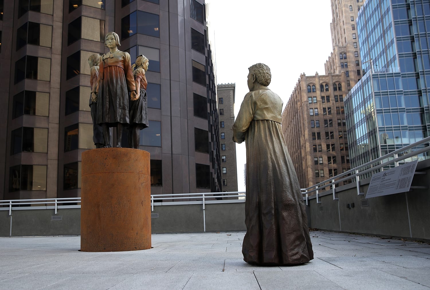 Who are the comfort women, and why are U.S.-based memorials for them controversial?