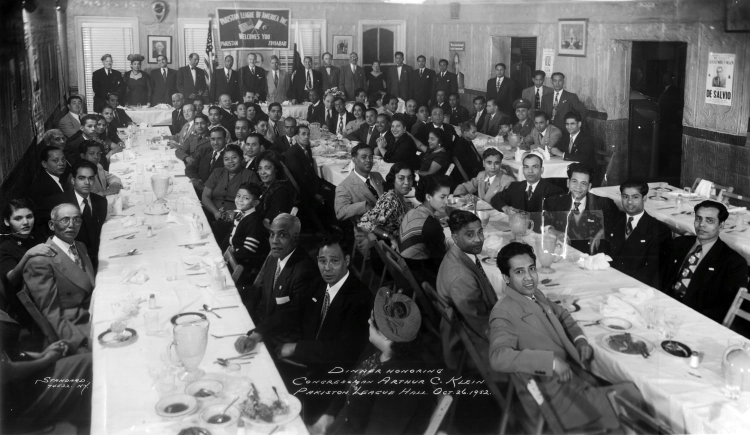 NBC News (2019), photo courtesy of the family of Ibrahim Chowdhury highlighting a 1952 banquet, including mostly former ship workers from Bangladesh with their interracial families.