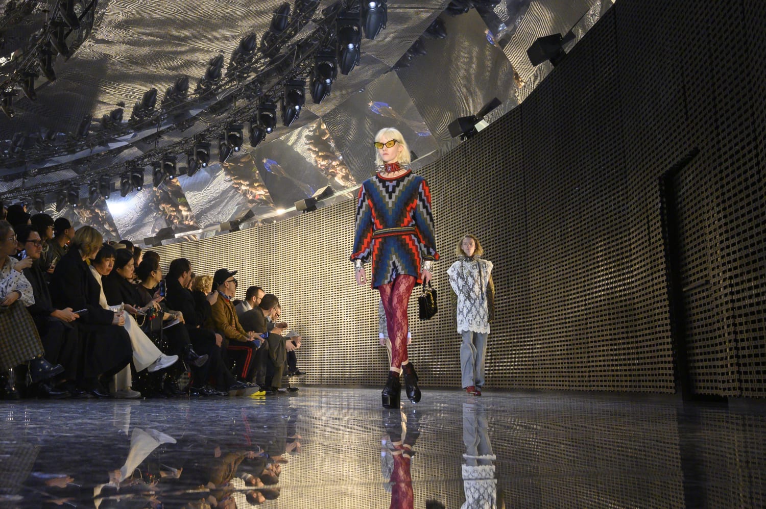 A model takes to the catwalk during the Louis Vuitton fashion show as part  of the