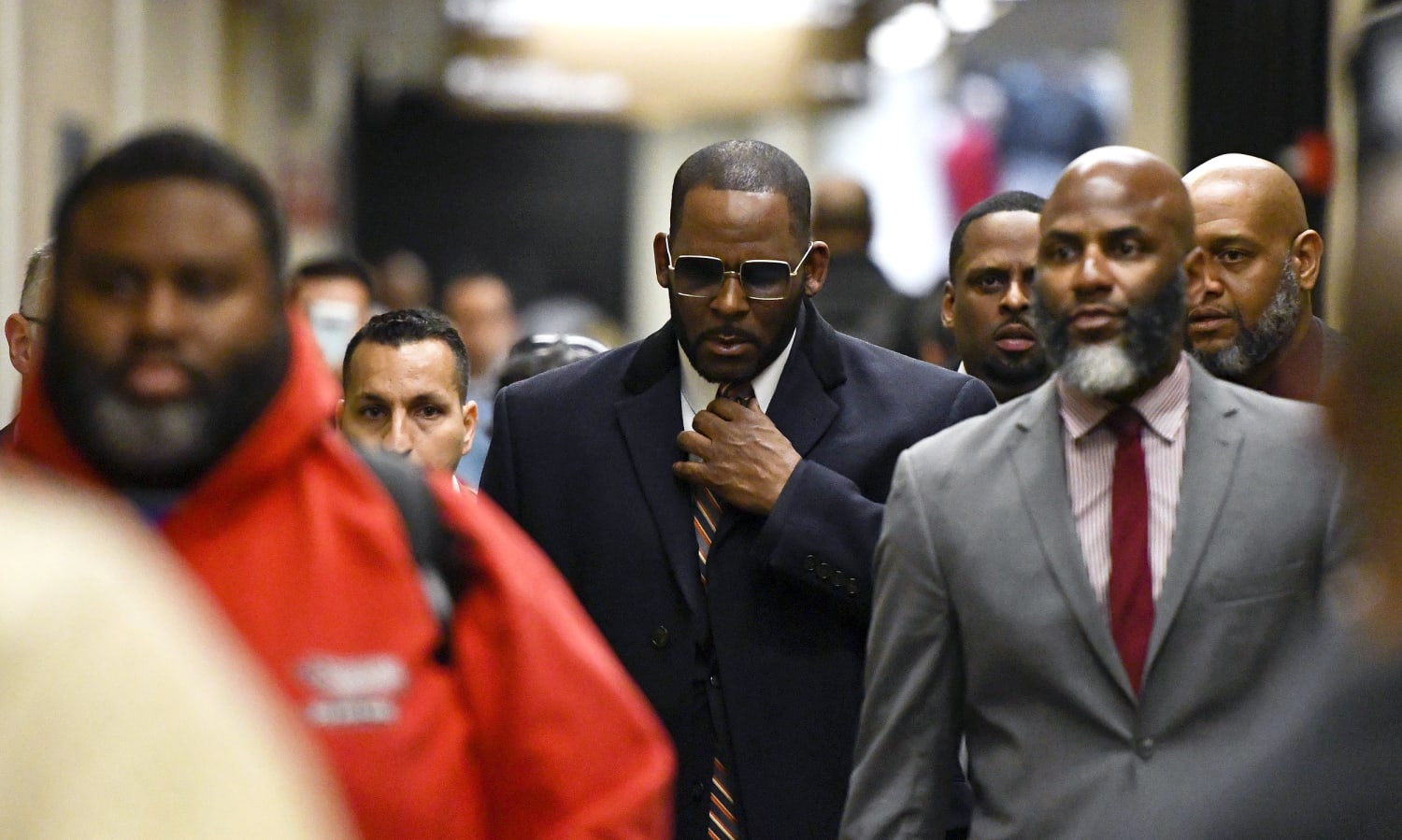 R. Kelly charged 11 counts of sexual assault and abuse