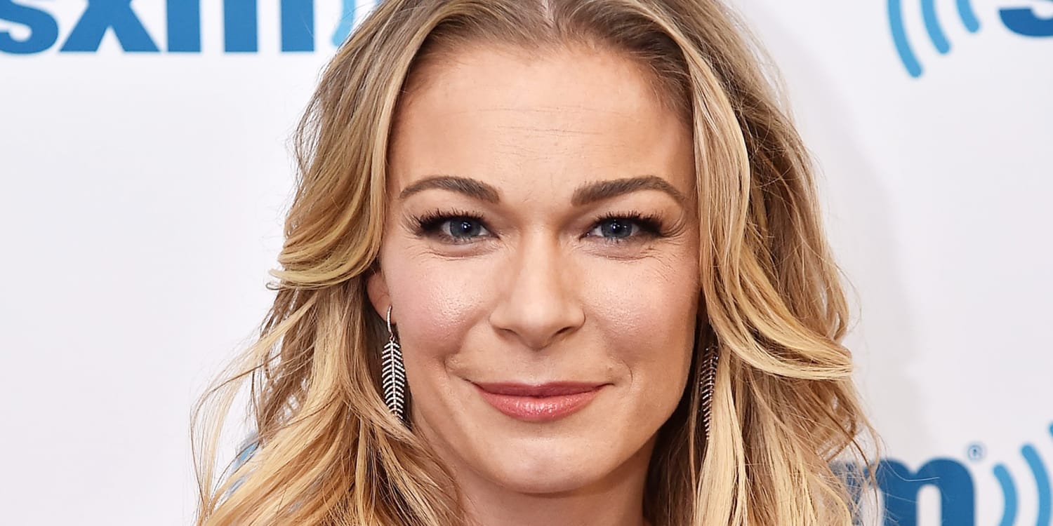 LeAnn Rimes criticized for not capitalizing the 'G' in 'god' tattoo