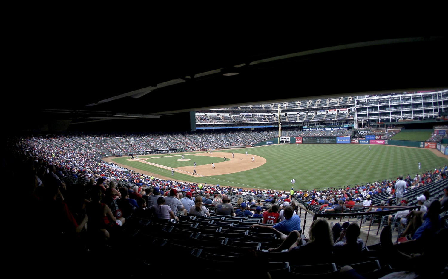 The Texas Rangers banned a fan after a Hispanic family says he harassed  them at a game