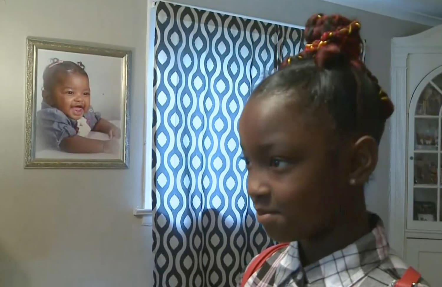 8-year-old girl in Michigan denied school picture because of red in her hair