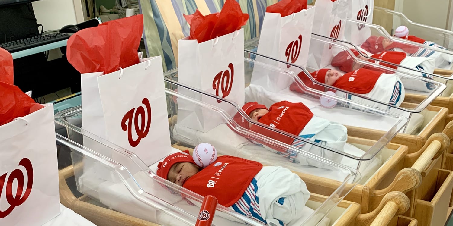 Newborns dress in Washington Nationals gear during World Series