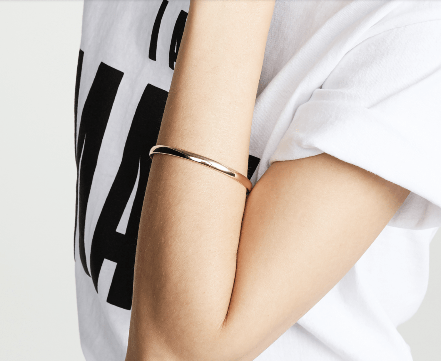 The Kate Spade heart of gold bangle is on sale