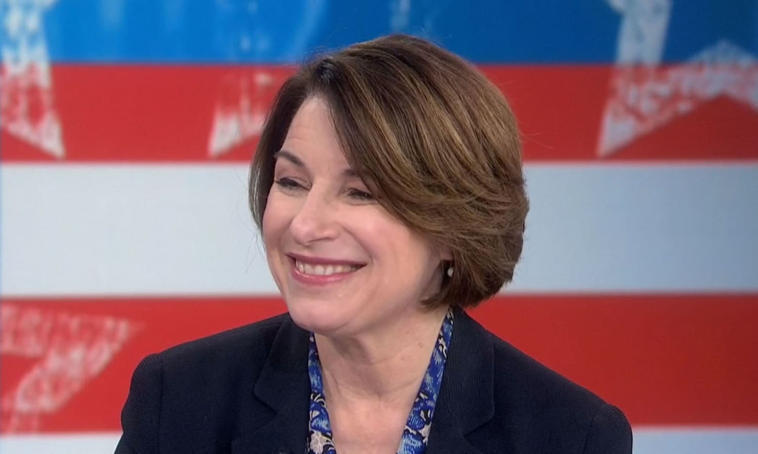Amy Klobuchar rejects idea that moderate Dems are trying to crush Sanders.