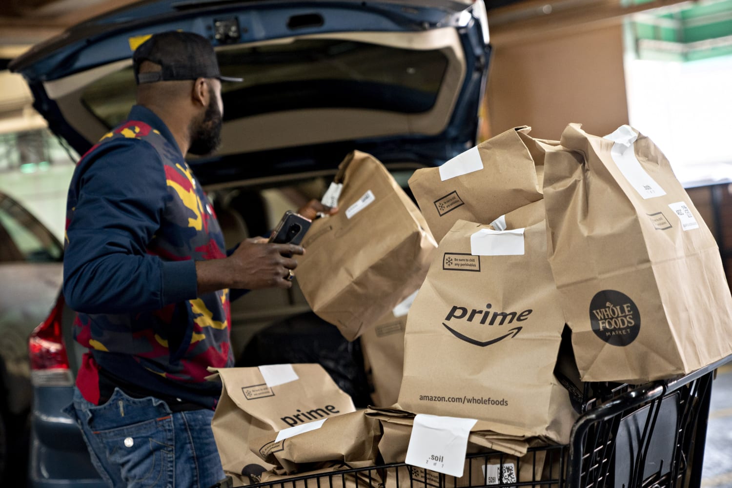stops accepting new online grocery customers amid surging demand