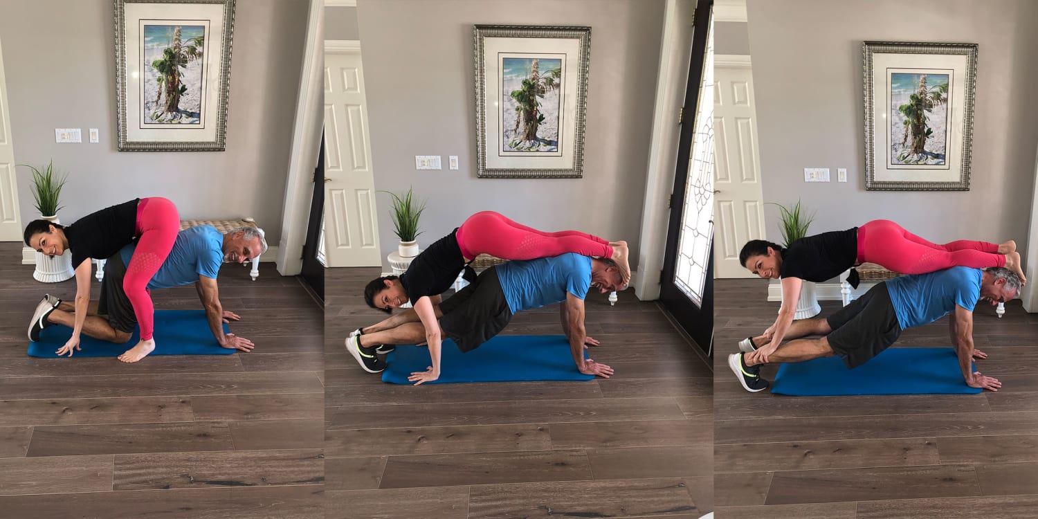 Premium Photo | Two women perform a paired exercise kumbhakasana a plank  pose one person is on top of the other