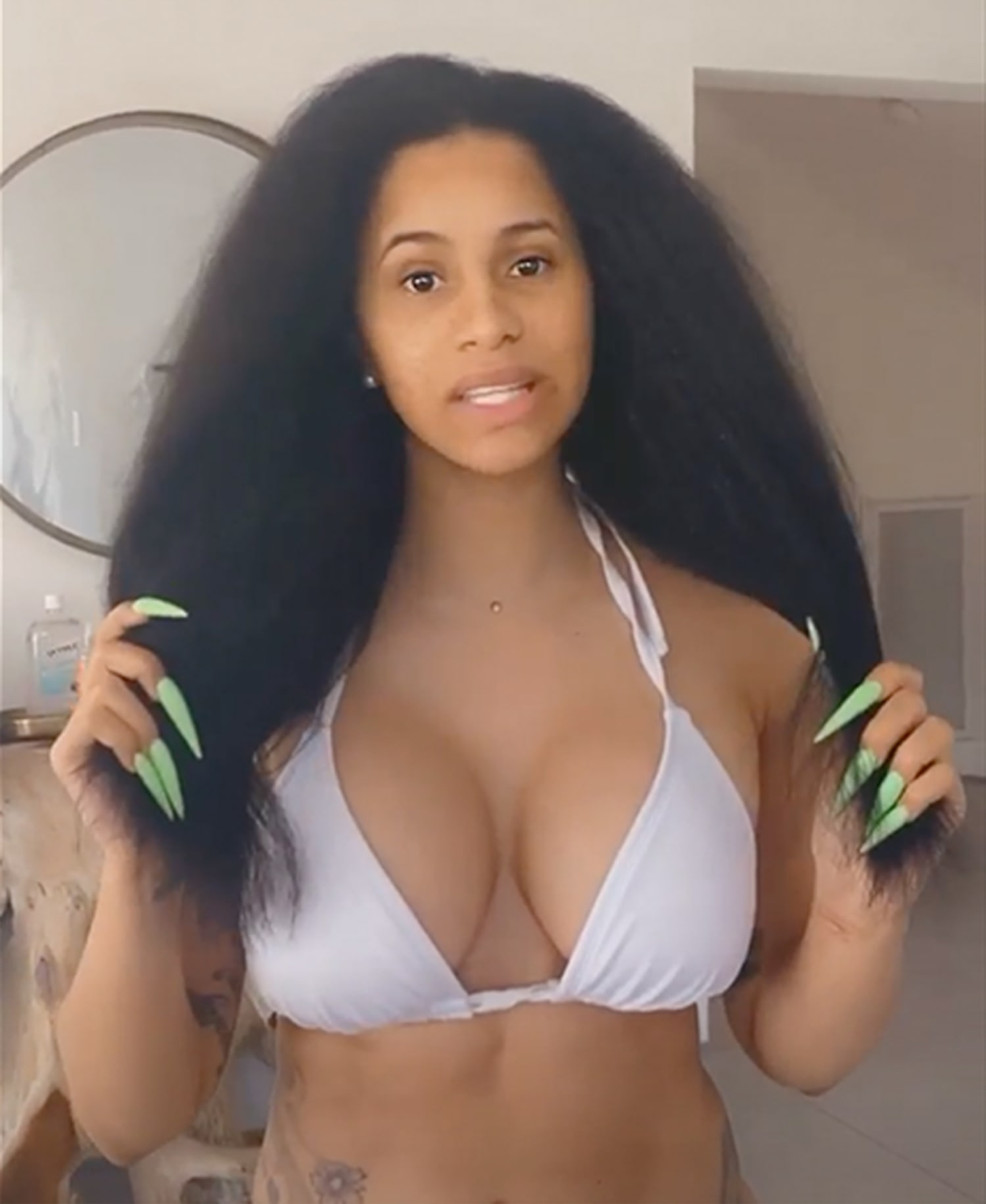 Cardi B shows off her natural hair texture