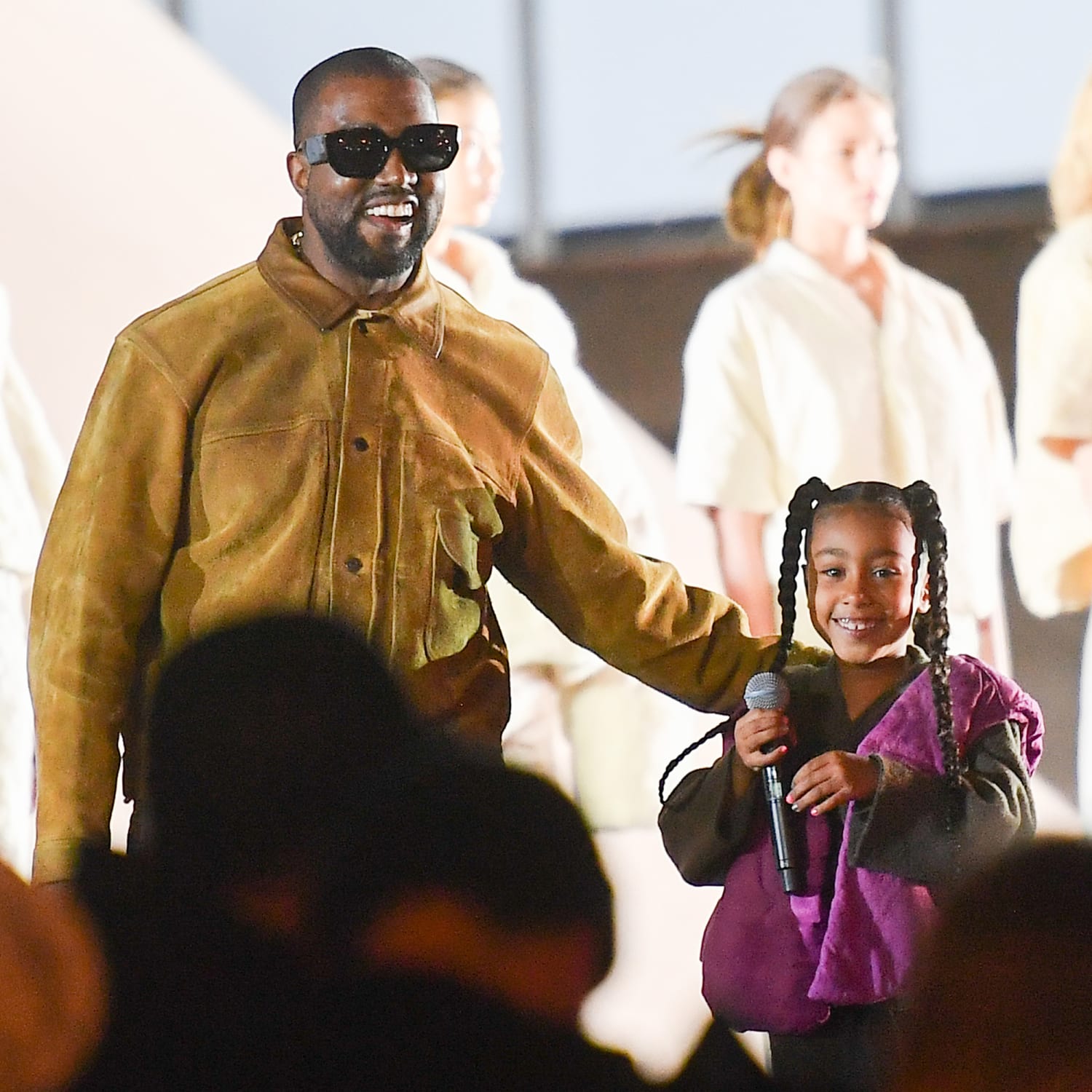 Kim Kardashian laughs as Kanye West and daughter North West dance
