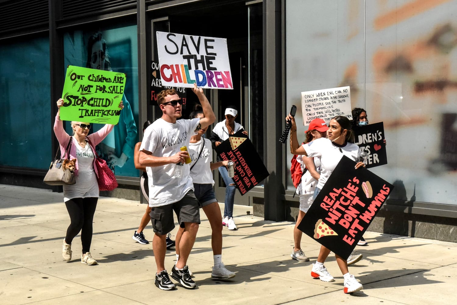 Haast je groentje Sandalen QAnon looms behind nationwide rallies and viral #SavetheChildren hashtags