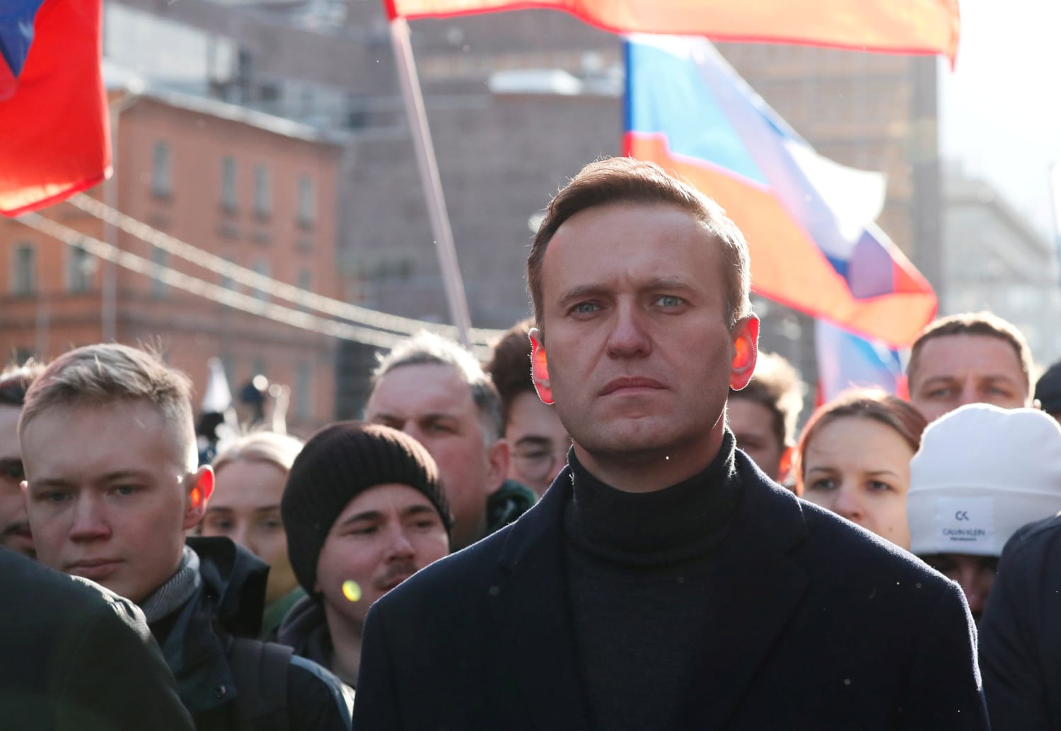 Alexei Navalny, opponent of Putin, improving after suspected poisoning,  hospital says