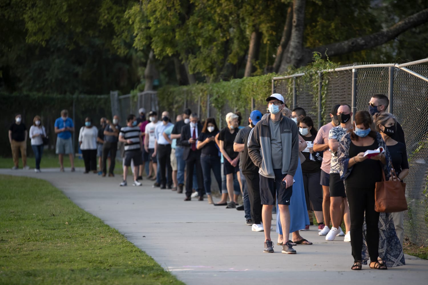 Long lines reported as early voting begins in Texas