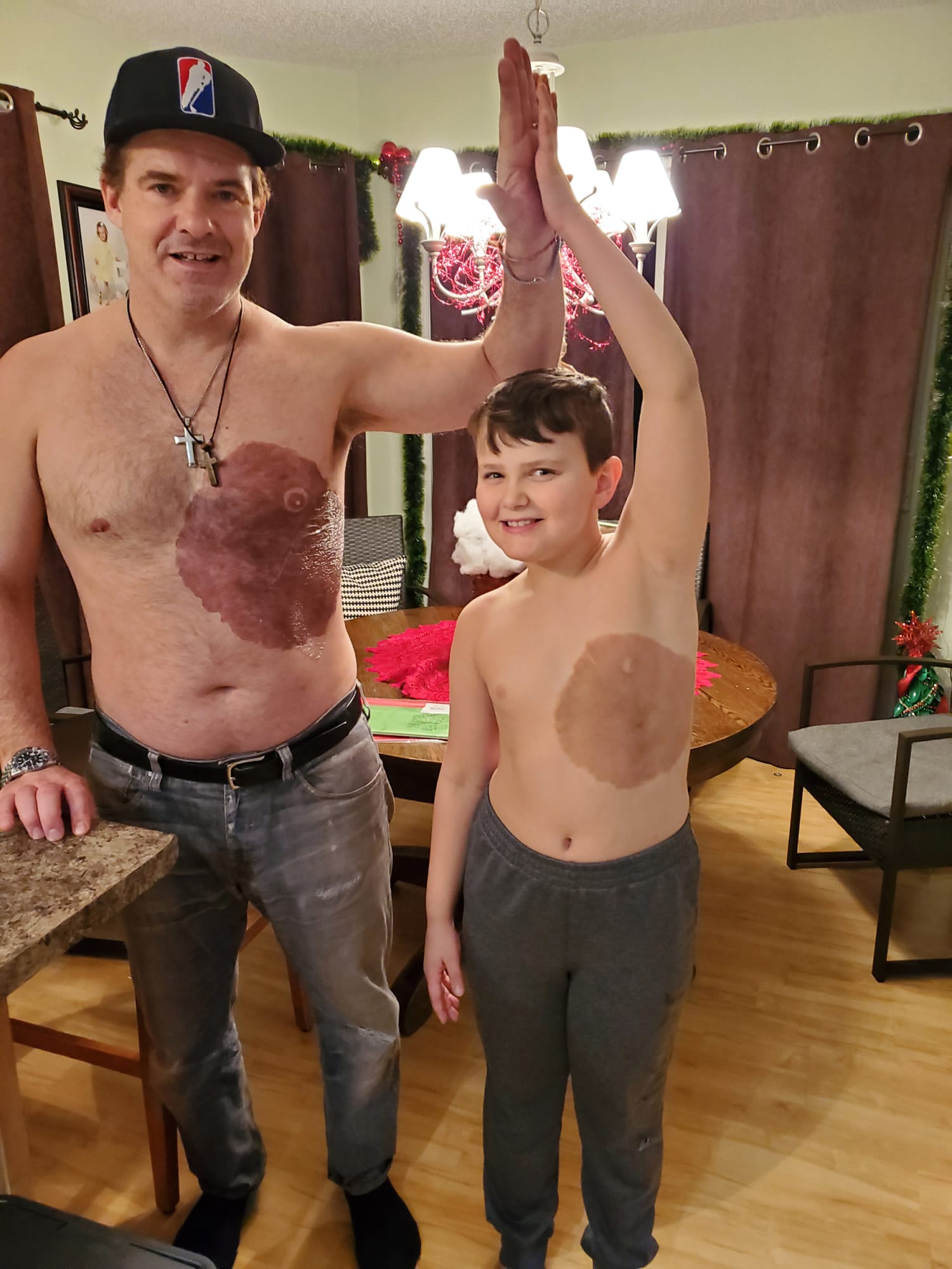 Dad spends 30 hours getting a tattoo that matches his son's birthmark