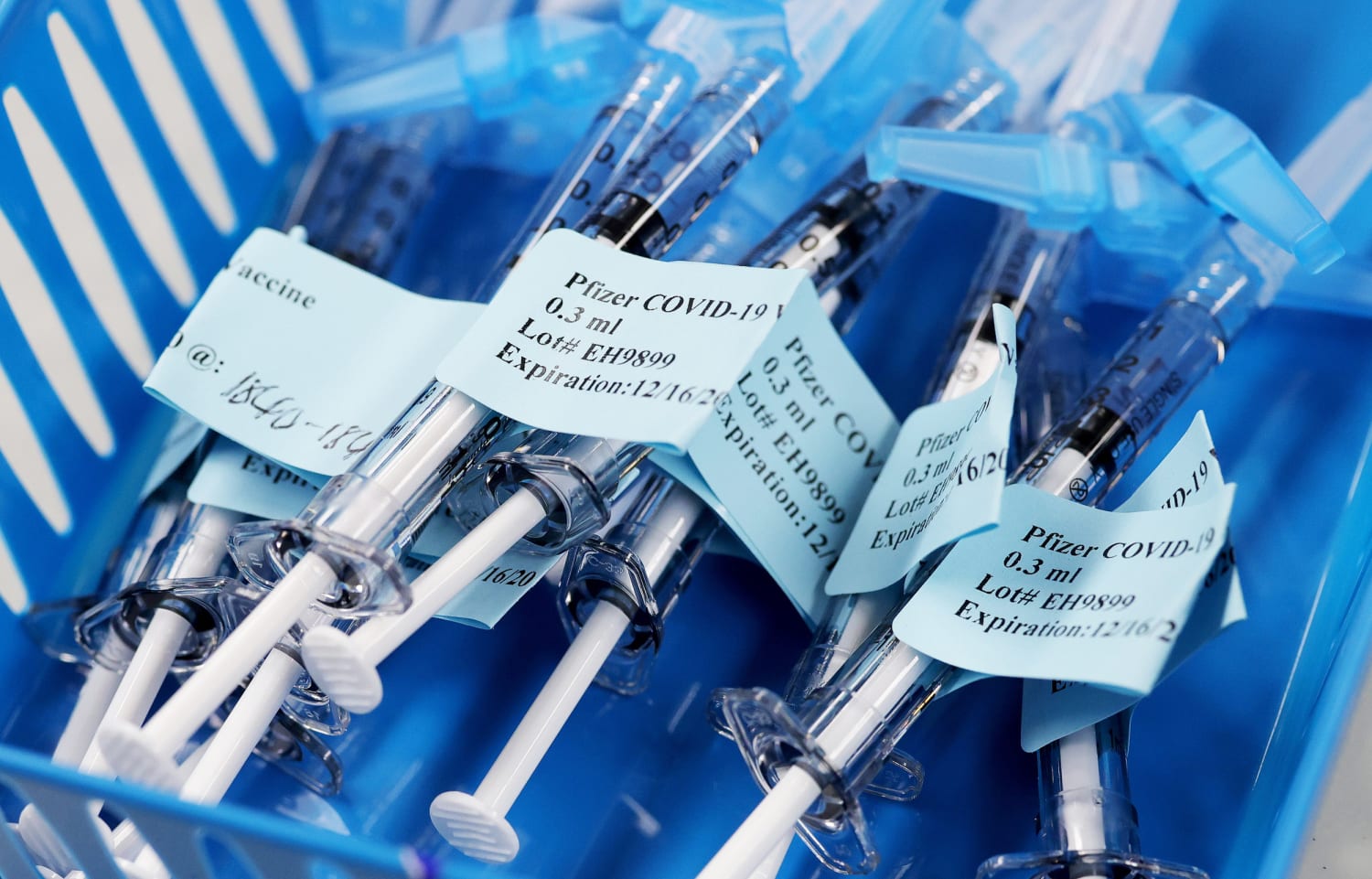 Pfizer vaccine vials hold some extra doses — experts say that's normal