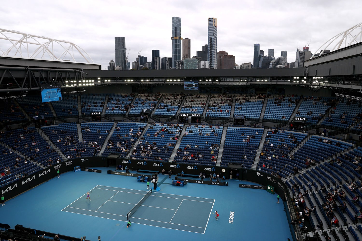 Australian gets underway with tennis fans courtside, world adjusts to Covid