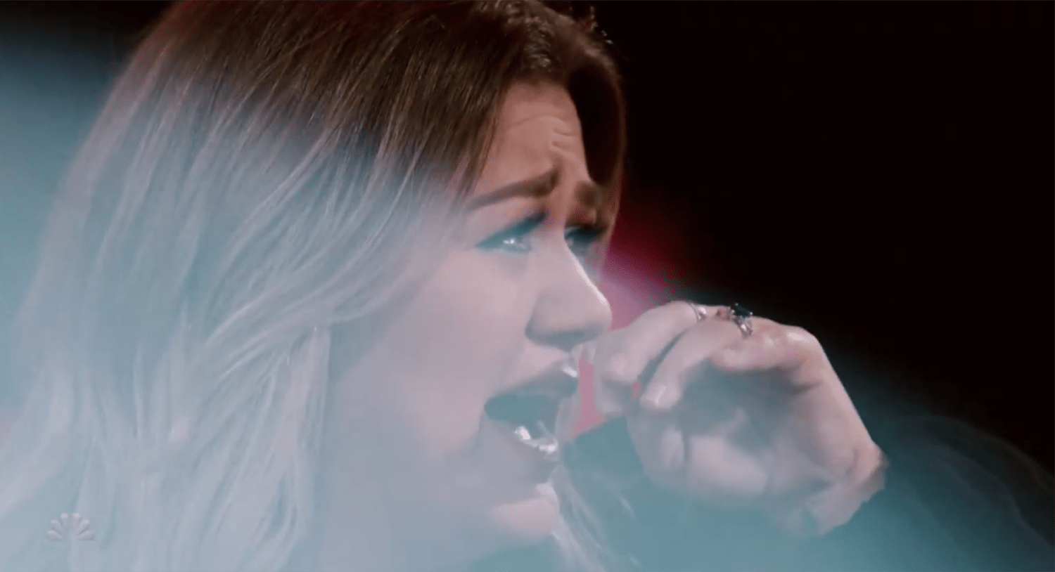 Kelly Clarkson Tears Up Listening To Emotional Performance On The Voice