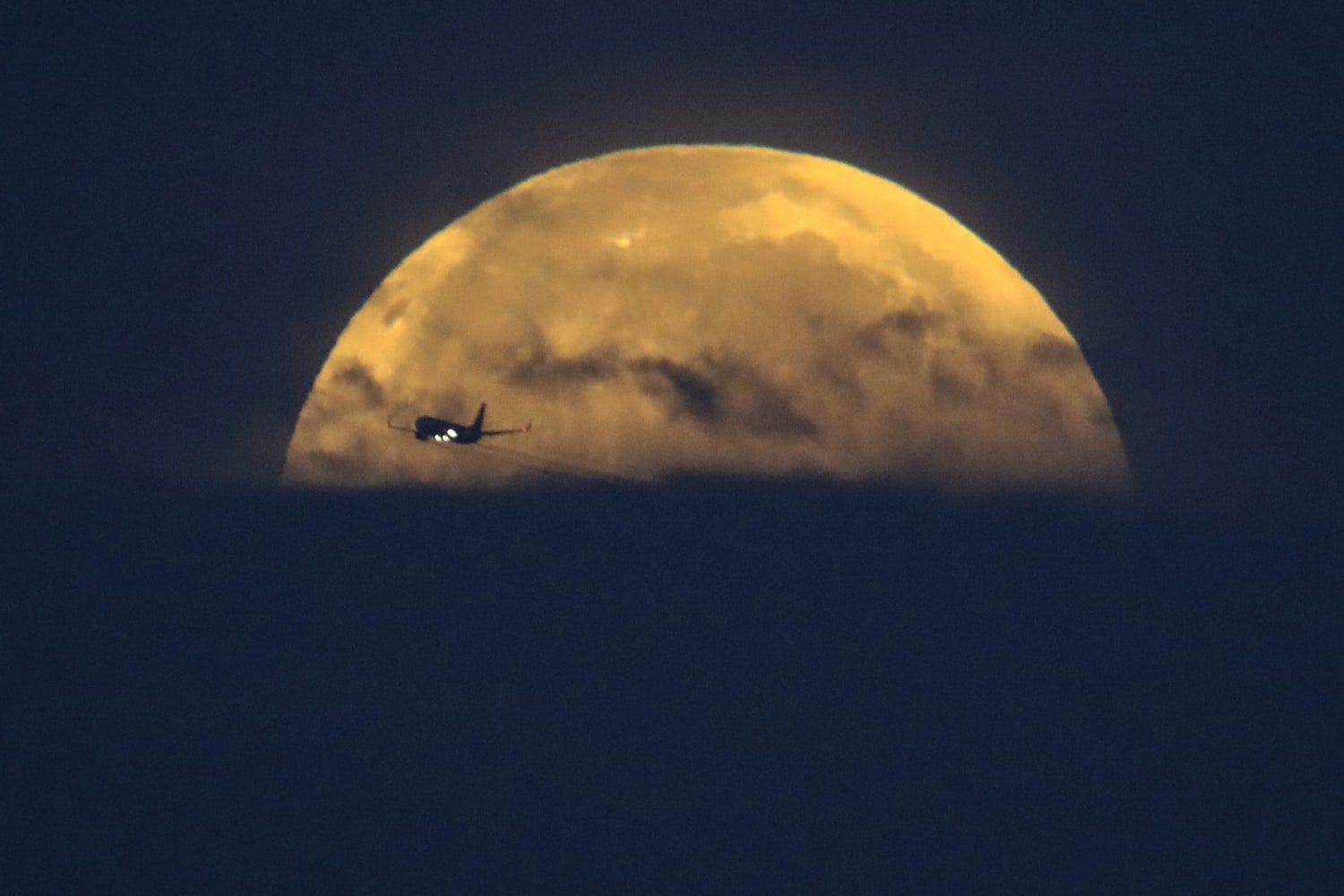 Photos A Super Flower Blood Moon Blossoms Over Earth