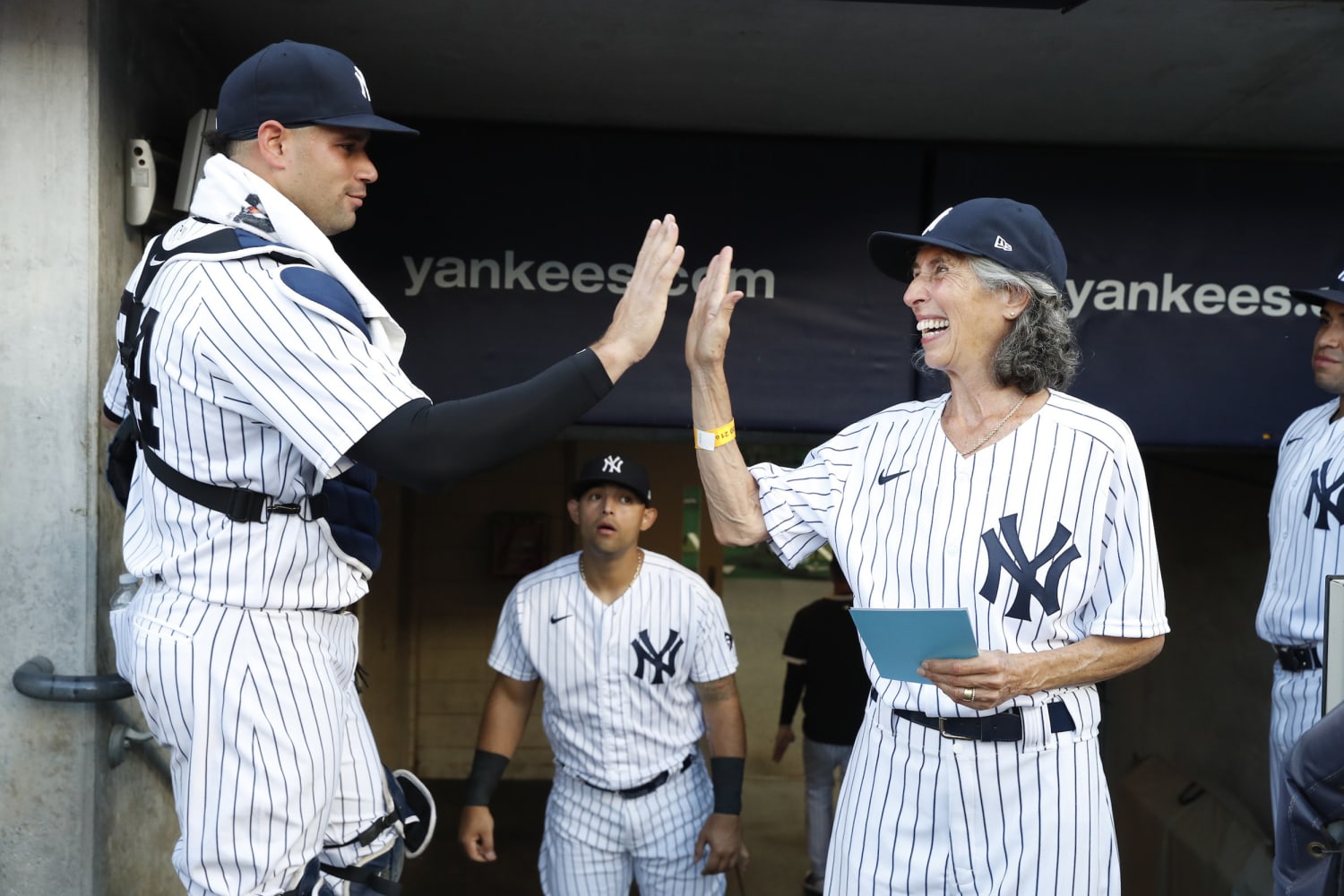 70-year-old New York Yankees fan becomes honorary bat girl