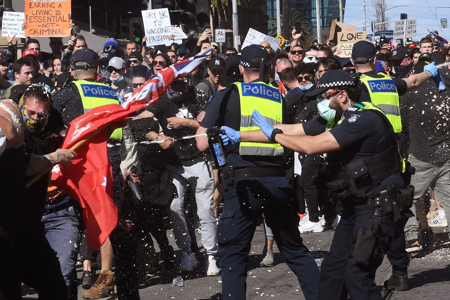 Police clash with anti-lockdown protesters as Australia reports record  Covid cases