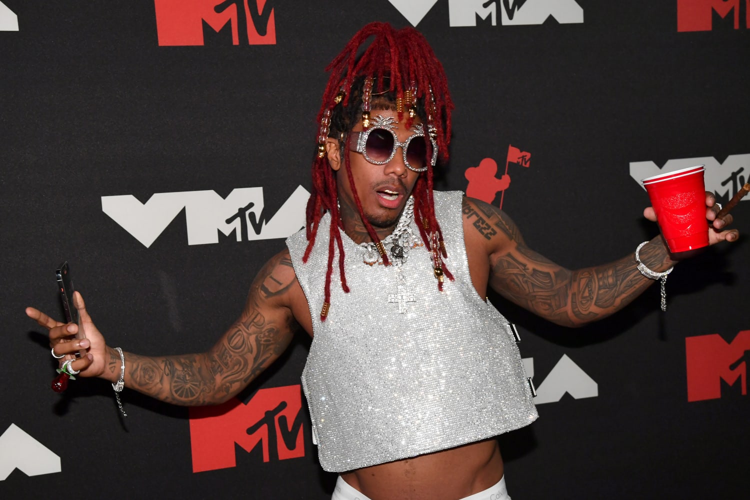 Nick Cannon channels Mortal Kombat in Louis Vuitton MUZZLE on starry MTV  Movie Awards red carpet