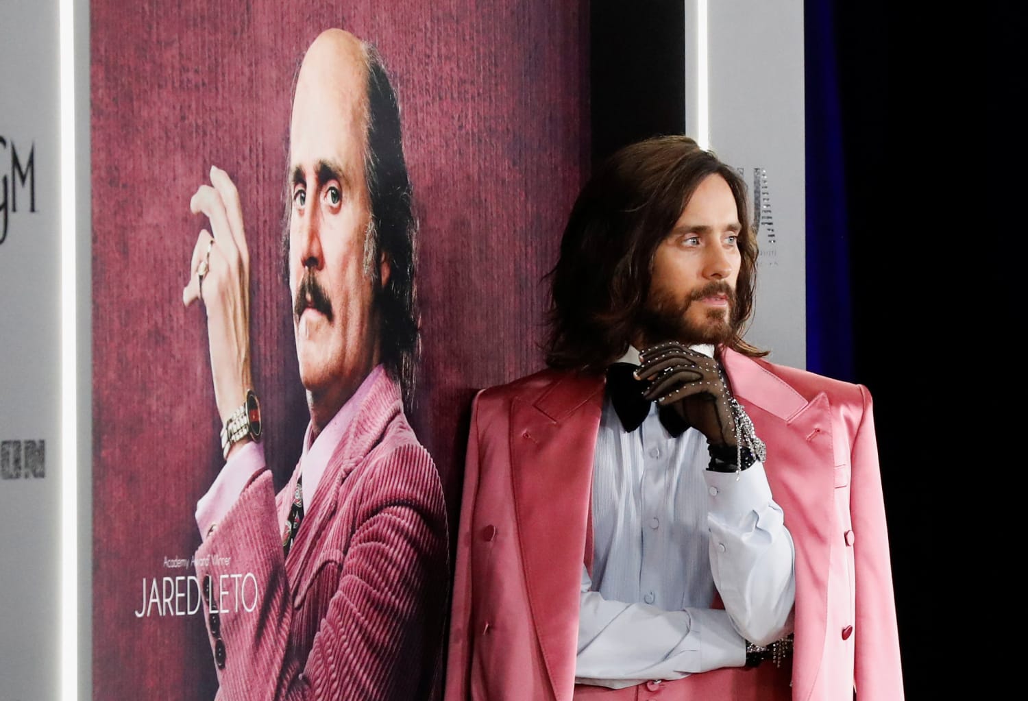 Jared Leto pairs pink suit with Gucci black gloves