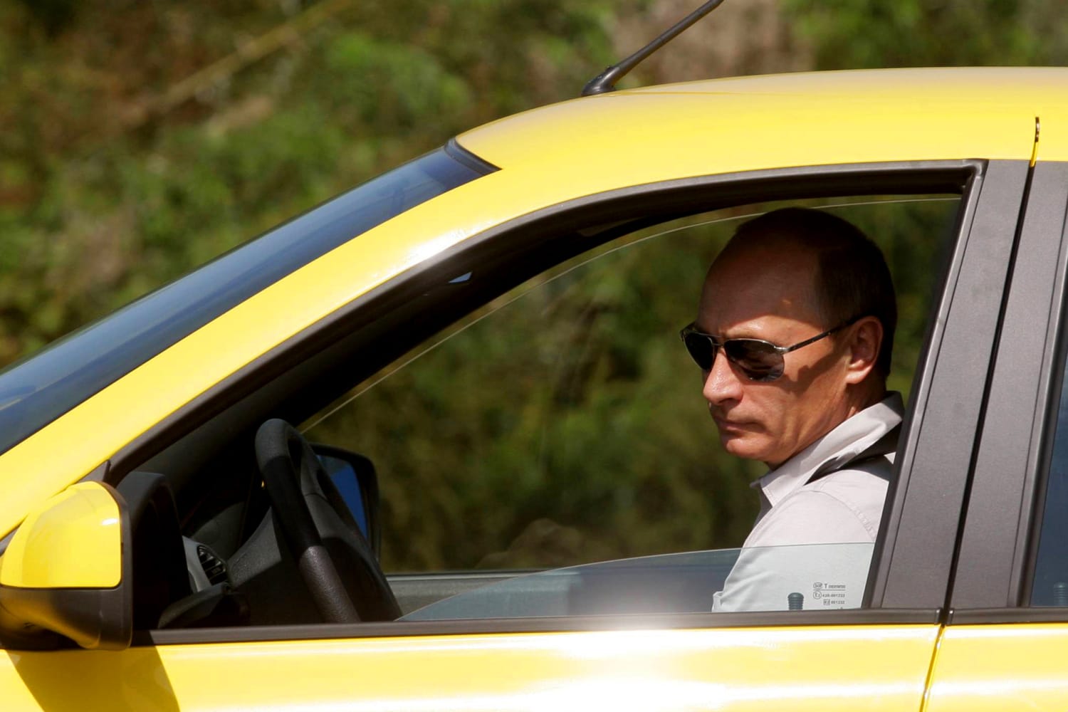 Putin laments Soviet collapse, says he moonlighted as taxi driver to earn money