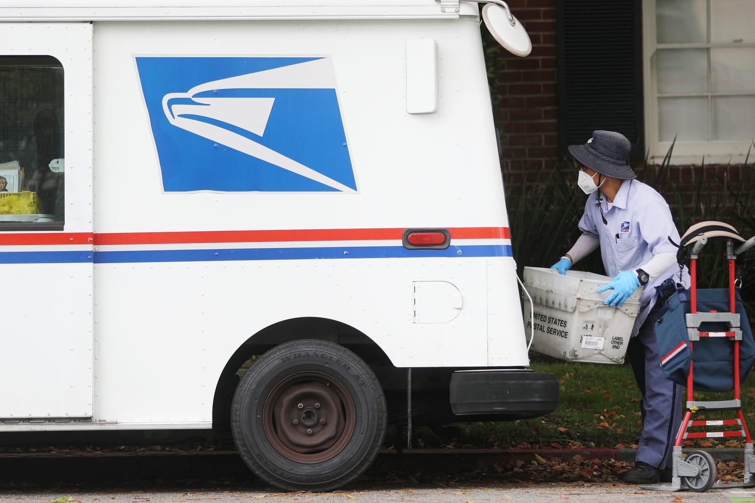 Postal Service reaches settlement with NAACP over delivery of mail-in ballots