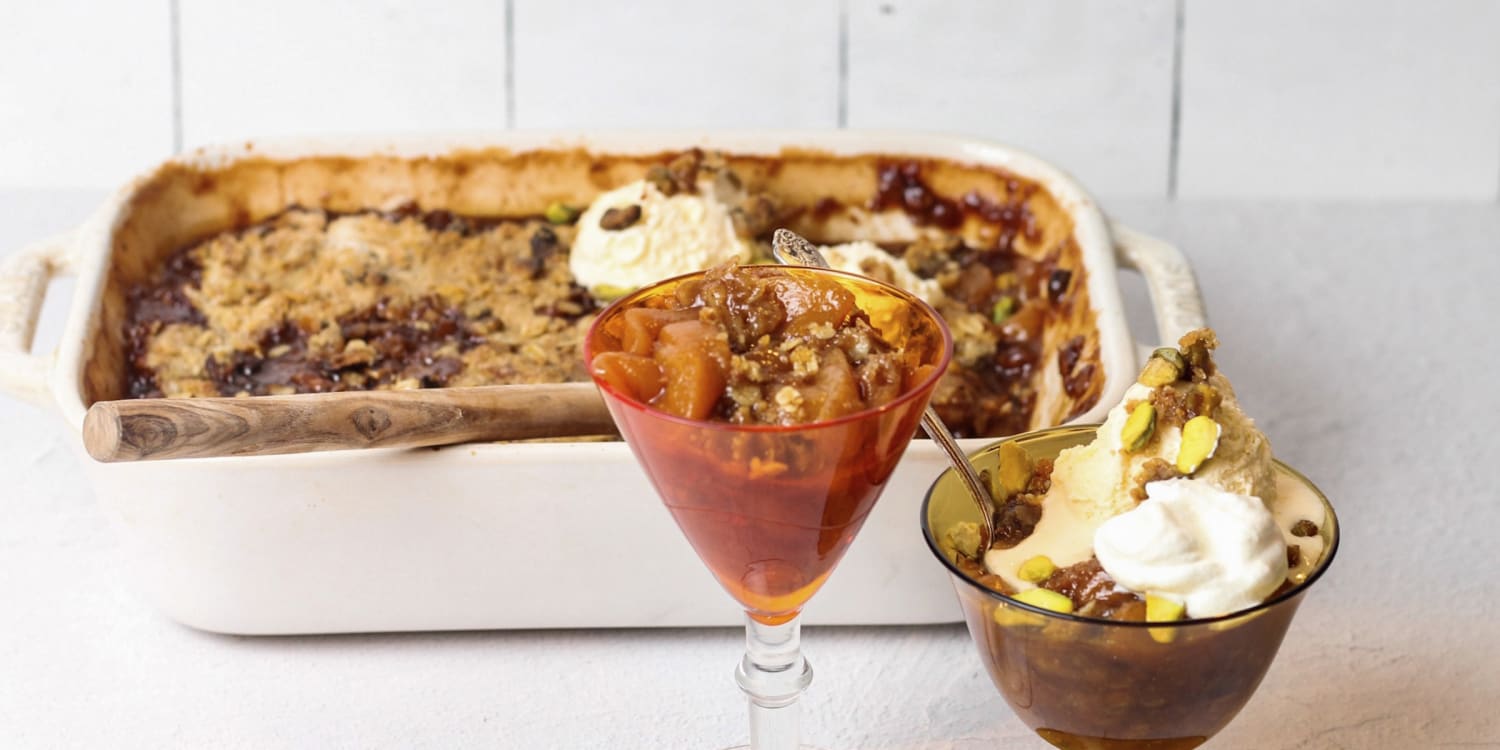 Warm up summery peach cobbler with a nutty topping and spices