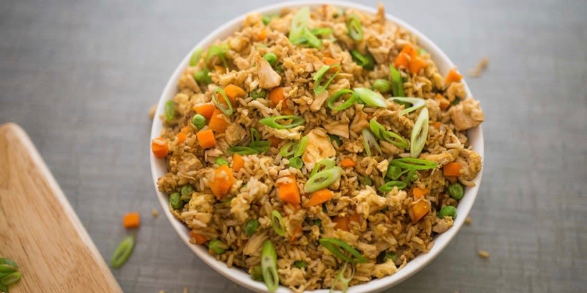 Turn rotisserie chicken into flavorful fried rice in this 20-minute meal