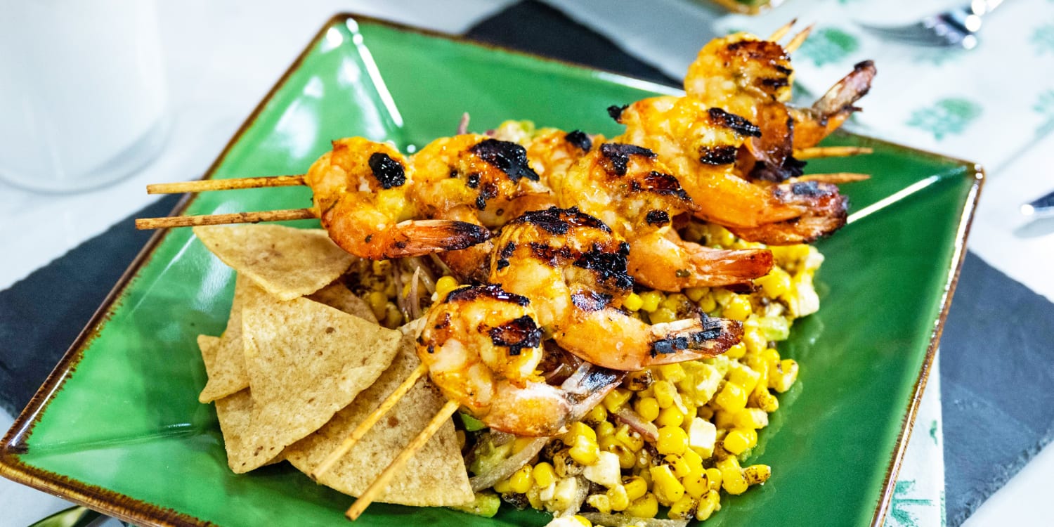 A late summer salad featuring grilled shrimp, corn and avocado