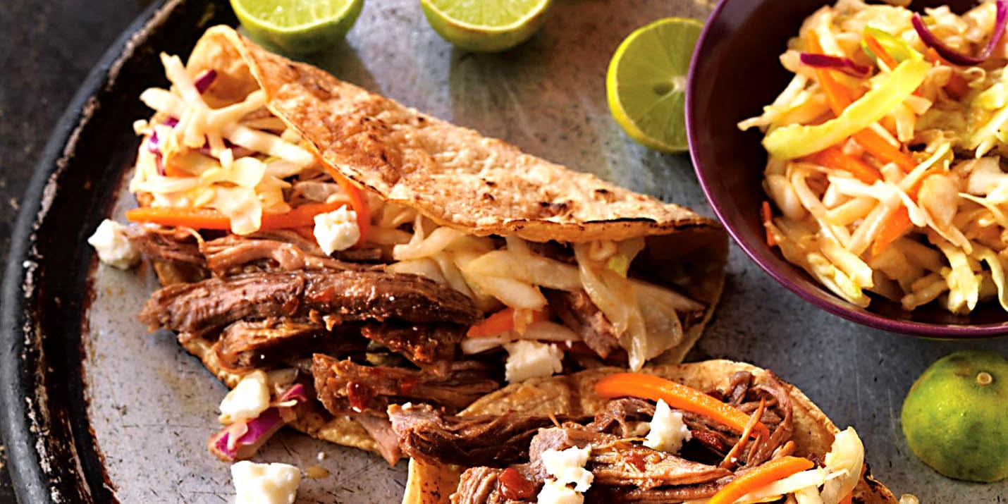 Fill tacos with tender beer-braised beef and crunchy coleslaw