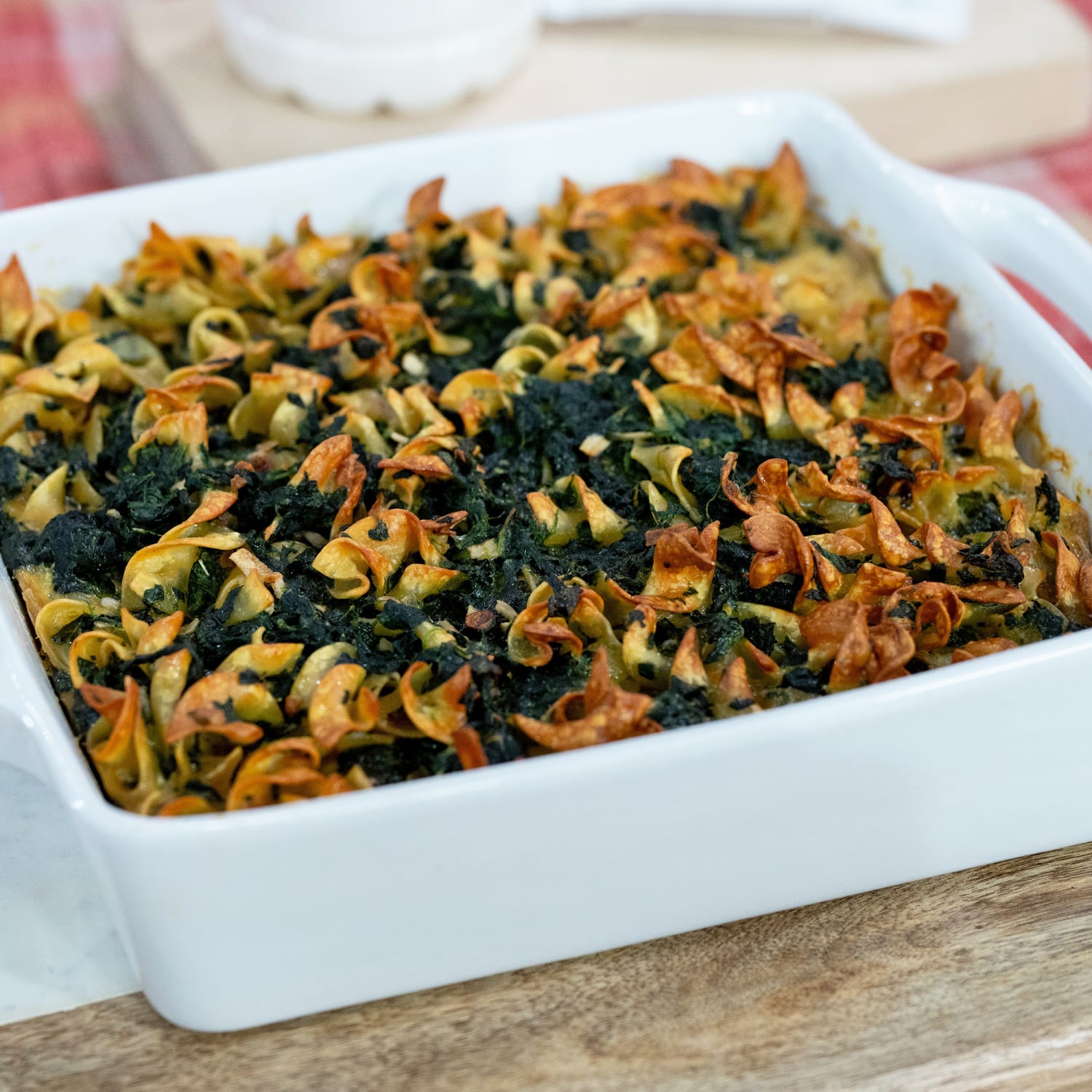 https://media-cldnry.s-nbcnews.com/image/upload/newscms/2023_46/2039809/ayesha-nurdjaja-spinach-noodle-casserole-1x1-zz-231116.jpg