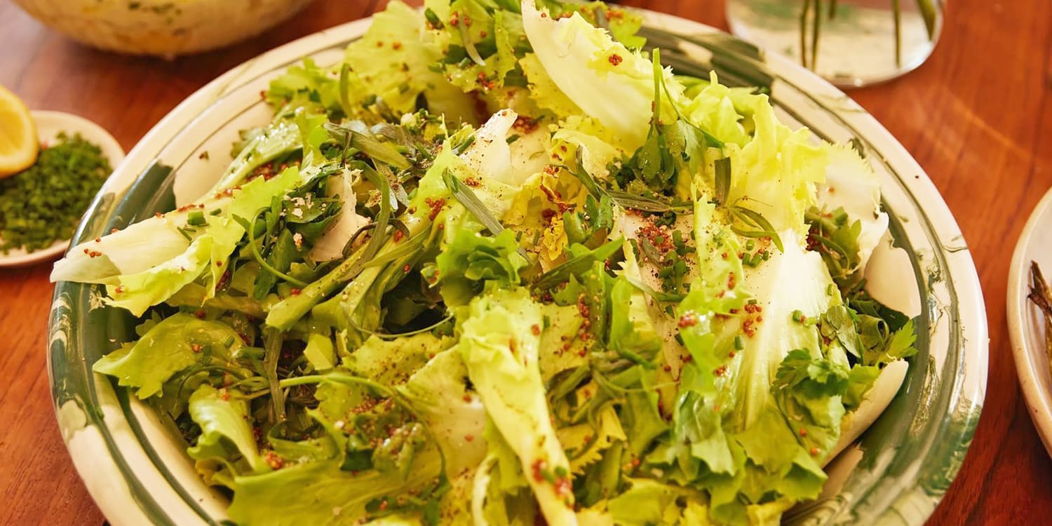 Serve this salad of bitter greens and herbs with heavy winter meals