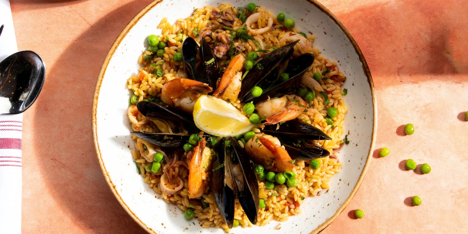 Wow friends and family with this seafood-studded orzo paella 