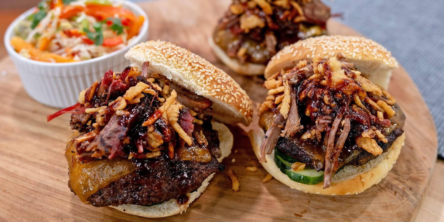 Top burgers with brisket, cheddar and crispy onions the Pig Beach way