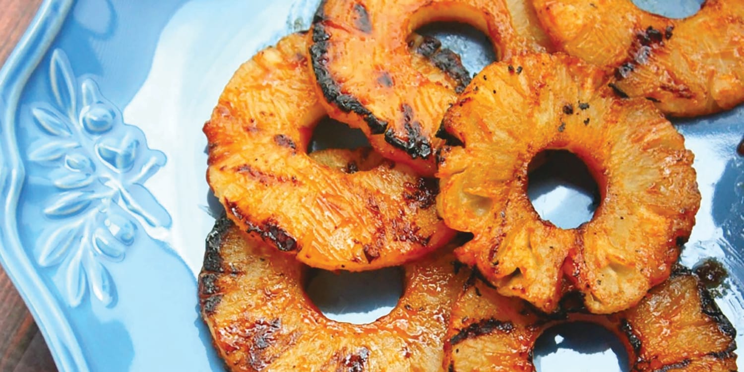 Grill pineapple slices with barbecue sauce for a sweet and savory side