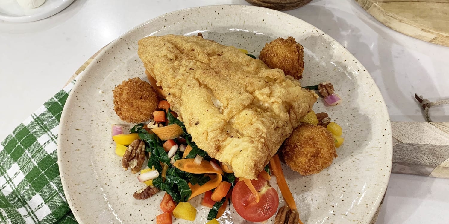 Celebrate Juneteenth with a collard greens salad topped with fried catfish