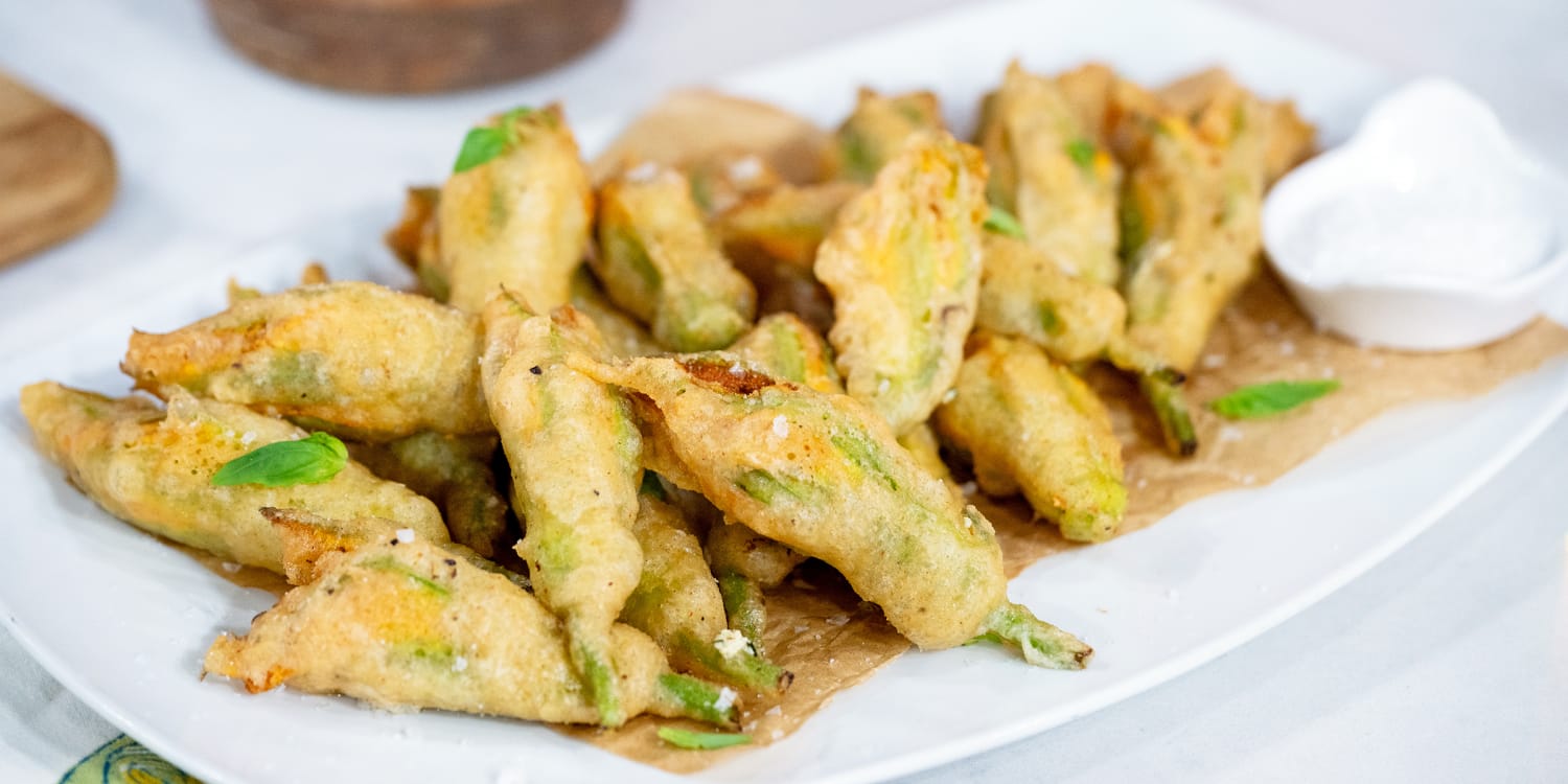 Stuff squash blossoms with ricotta cheese for a summery snack